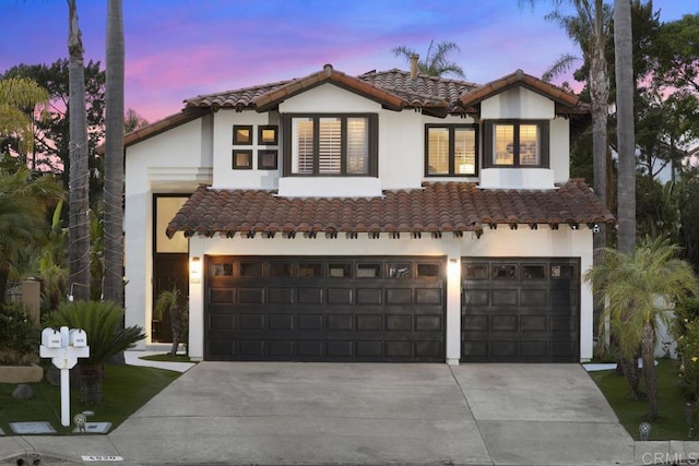 4520 Tarantella Ln, San Diego, CA 92130 - mediterranean / spanish-style house featuring concrete driveway, a tile roof, and a garage
