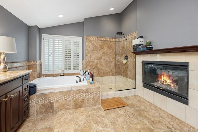 4520 Tarantella Ln, San Diego, CA 92130 - bathroom with a garden tub, lofted ceiling, a walk in shower, a fireplace, and recessed lighting