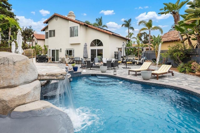 4520 Tarantella Ln, San Diego, CA 92130 - outdoor pool with a patio and an outdoor hangout area