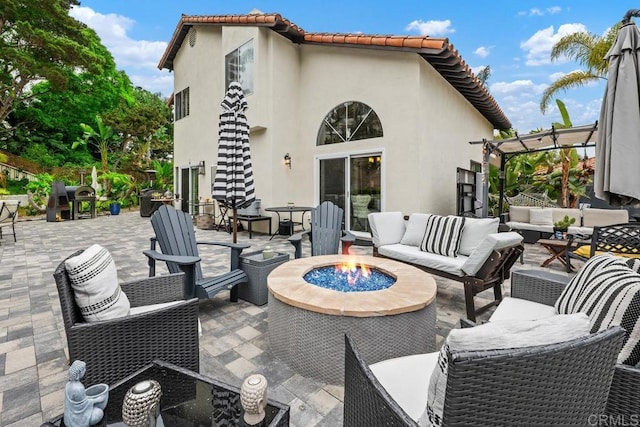 4520 Tarantella Ln, San Diego, CA 92130 - view of patio / terrace with an outdoor living space with a fire pit, a pergola, and grilling area
