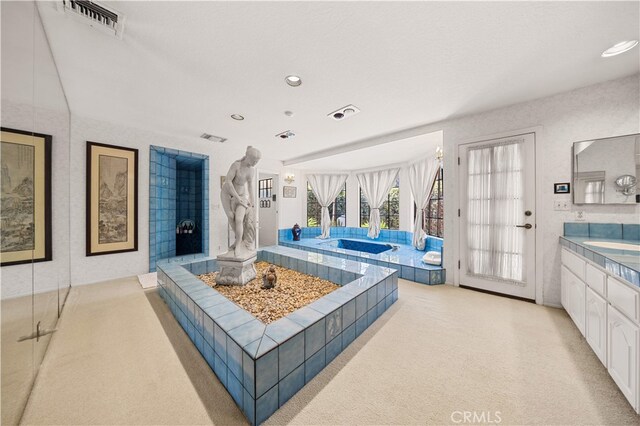 2360 Oakleaf Canyon Rd, Walnut, CA 91789 - living area featuring light colored carpet and recessed lighting