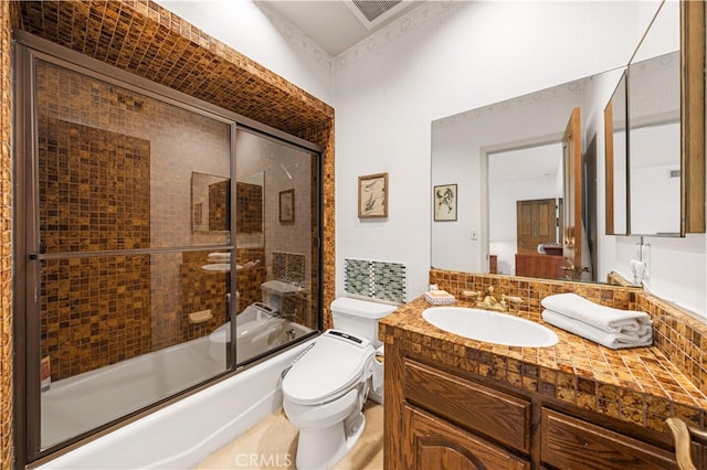 2360 Oakleaf Canyon Rd, Walnut, CA 91789 - bathroom with vanity, toilet, and combined bath / shower with glass door