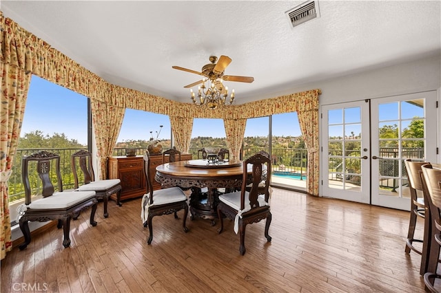 2360 Oakleaf Canyon Rd, Walnut, CA 91789 - dining area featuring a ceiling fan, hardwood / wood-style floors, and french doors