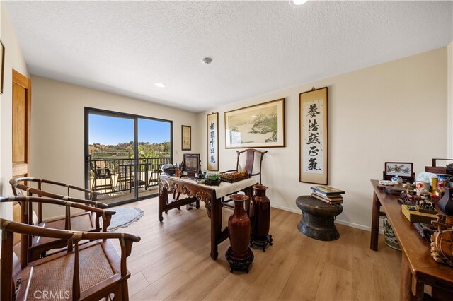 2360 Oakleaf Canyon Rd, Walnut, CA 91789 - office space featuring a textured ceiling, light wood finished floors, baseboards, and recessed lighting