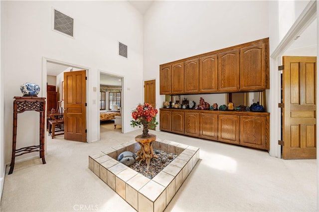 2360 Oakleaf Canyon Rd, Walnut, CA 91789 - hall featuring light carpet and a high ceiling