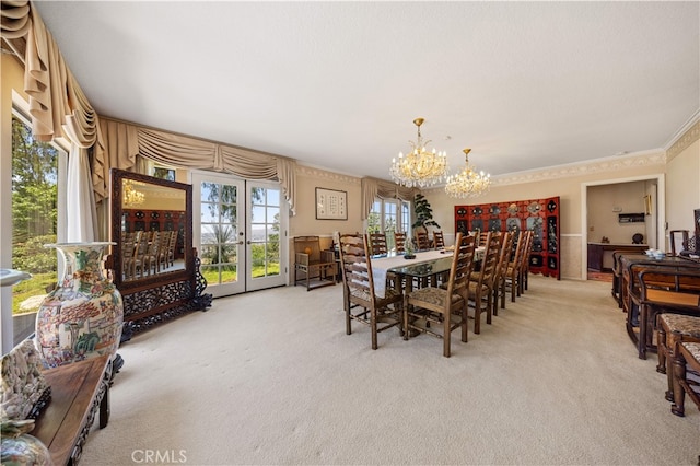 2360 Oakleaf Canyon Rd, Walnut, CA 91789 - dining room with light carpet, a chandelier, and crown molding