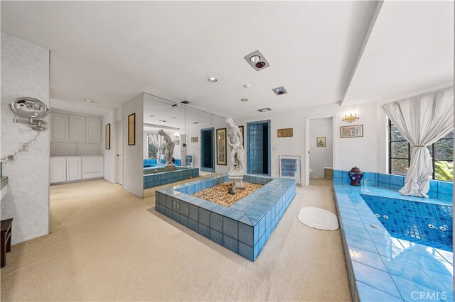 2360 Oakleaf Canyon Rd, Walnut, CA 91789 - living area featuring light carpet, a fireplace, and recessed lighting