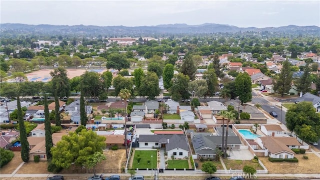 22940 Sherman Way, West Hills, CA 91307 - aerial perspective of suburban area featuring mountains and a pool area