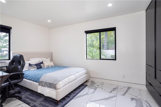 22940 Sherman Way, West Hills, CA 91307 - bedroom with recessed lighting and light marble finish flooring