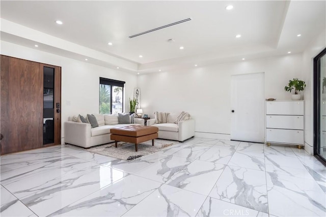 22940 Sherman Way, West Hills, CA 91307 - living area with recessed lighting, a raised ceiling, and light marble finish flooring