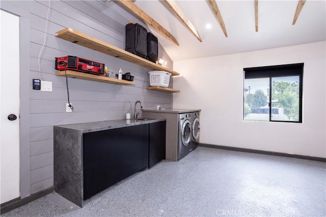 22940 Sherman Way, West Hills, CA 91307 - laundry room featuring washing machine and dryer and baseboards