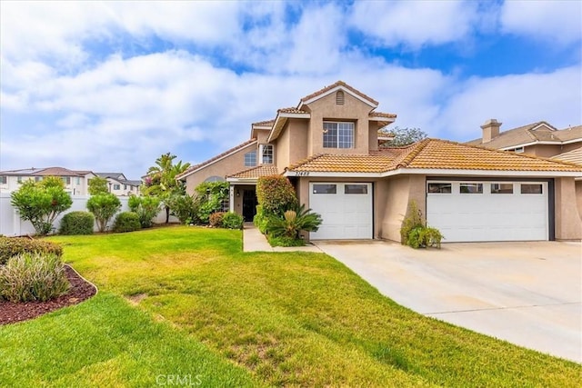 31488 Hallwood Ct, Menifee, CA 92584 - view of front of home featuring a tile roof, stucco siding, driveway, an attached garage, and a front lawn