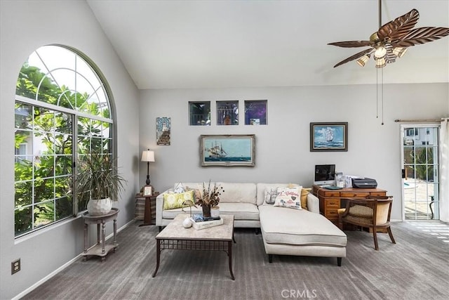 31488 Hallwood Ct, Menifee, CA 92584 - carpeted living room featuring a ceiling fan, baseboards, and lofted ceiling