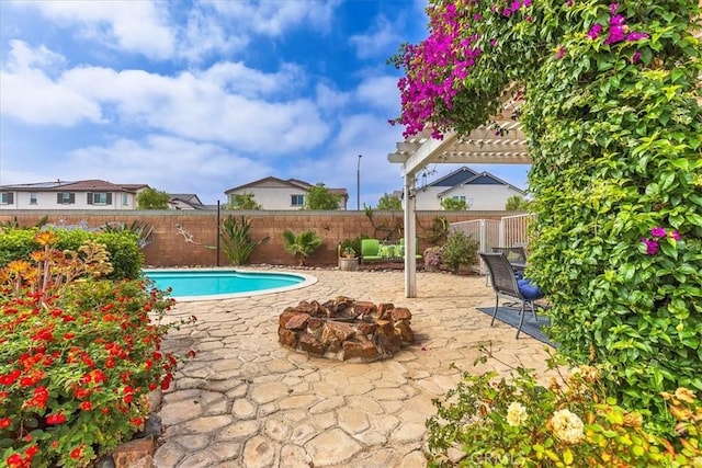 31488 Hallwood Ct, Menifee, CA 92584 - view of swimming pool with an outdoor fire pit, a fenced backyard, and a patio area