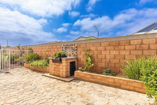 31488 Hallwood Ct, Menifee, CA 92584 - fenced backyard featuring a patio