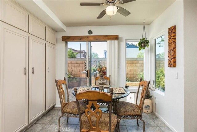 31488 Hallwood Ct, Menifee, CA 92584 - dining area featuring baseboards, a ceiling fan, and light tile patterned floors