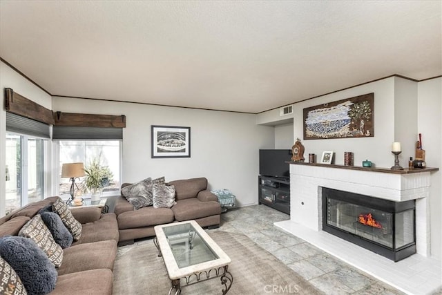 31488 Hallwood Ct, Menifee, CA 92584 - living room featuring a glass covered fireplace