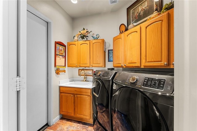 1574 Litchfield Ct, Banning, CA 92220 - laundry area with washer and dryer and cabinet space