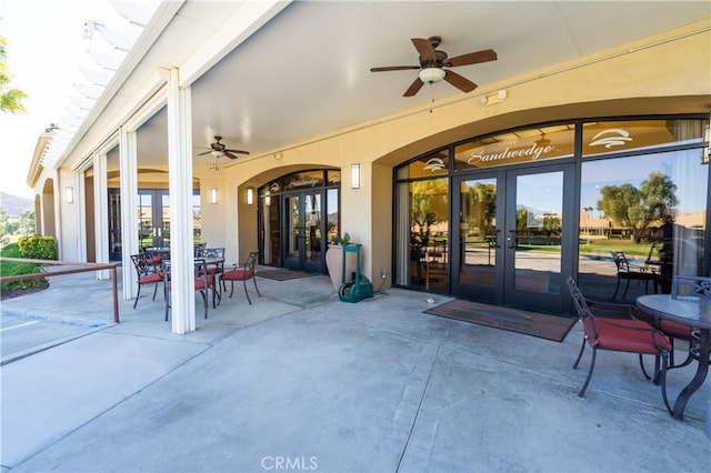 1574 Litchfield Ct, Banning, CA 92220 - view of patio featuring french doors, ceiling fan, and outdoor dining area
