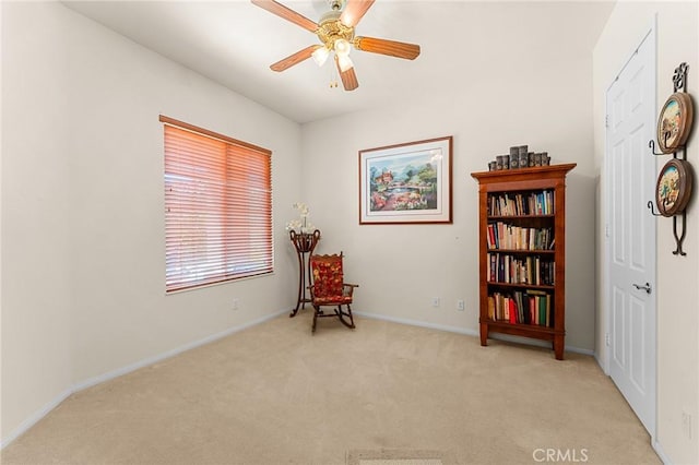 1574 Litchfield Ct, Banning, CA 92220 - living area with carpet flooring, ceiling fan, and baseboards