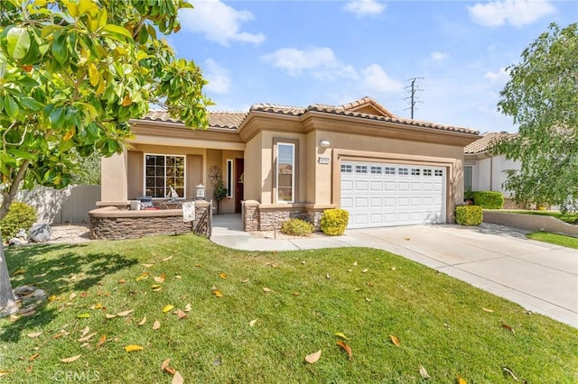 1574 Litchfield Ct, Banning, CA 92220 - view of front of home with stucco siding, driveway, a tiled roof, and a garage