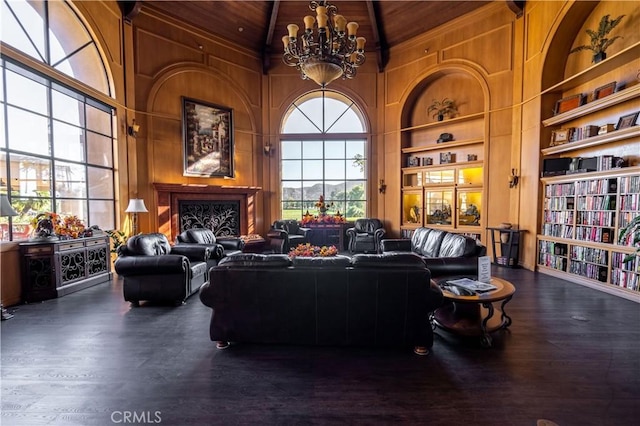 1574 Litchfield Ct, Banning, CA 92220 - living area featuring wooden ceiling, built in shelves, a chandelier, high vaulted ceiling, and wood finished floors
