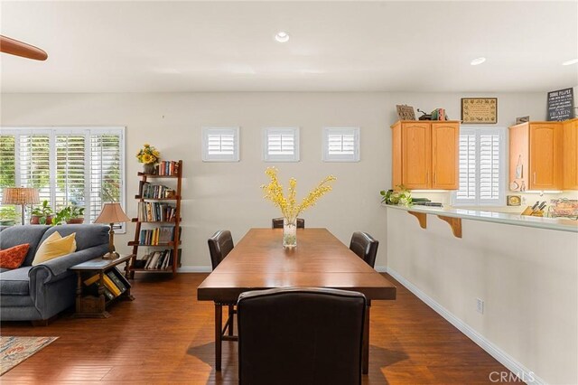 1574 Litchfield Ct, Banning, CA 92220 - dining room featuring plenty of natural light, dark wood-type flooring, recessed lighting, and baseboards