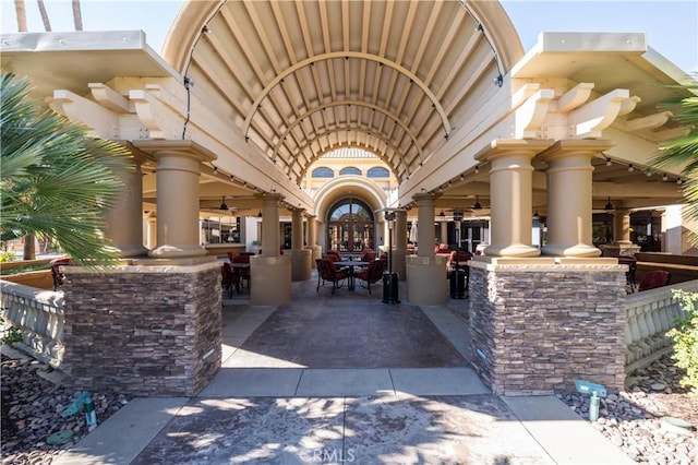 1574 Litchfield Ct, Banning, CA 92220 - entrance to property featuring a ceiling fan, a patio, and french doors