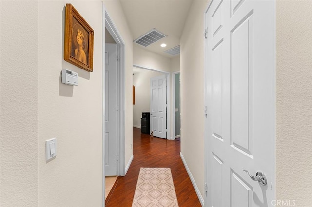 1574 Litchfield Ct, Banning, CA 92220 - corridor with dark wood-type flooring, recessed lighting, and baseboards