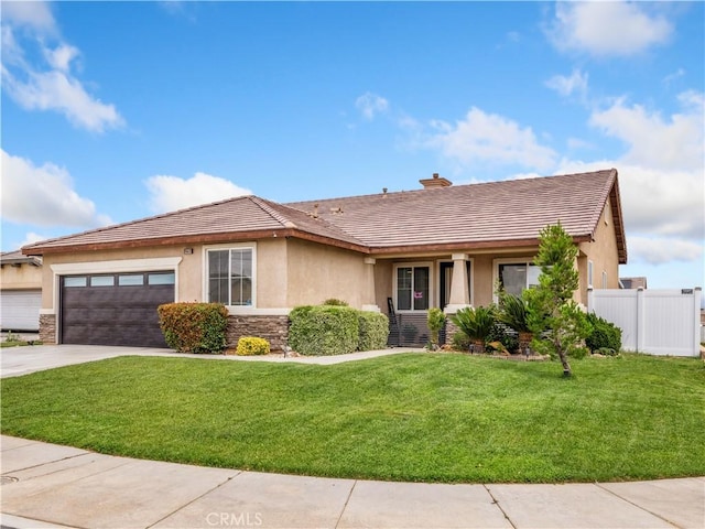 15631 Moccasin Ct, Victorville, CA 92394 - ranch-style home featuring stucco siding, a garage, stone siding, concrete driveway, and a tiled roof