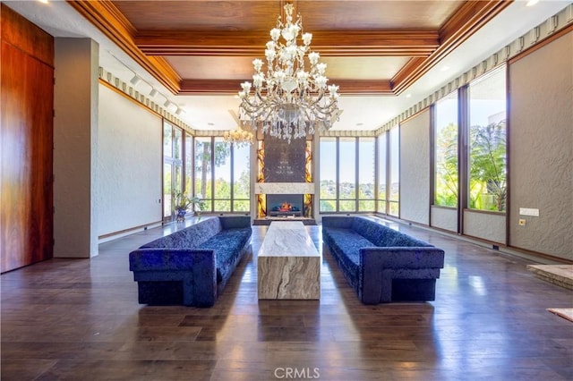 23615 Falcons View Dr, Diamond Bar, CA 91765 - living room featuring crown molding, a textured wall, a chandelier, a lit fireplace, and coffered ceiling