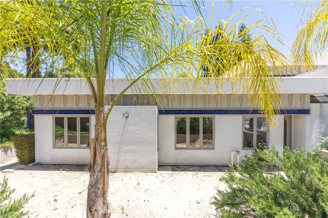 23615 Falcons View Dr, Diamond Bar, CA 91765 - back of house with stucco siding and a patio