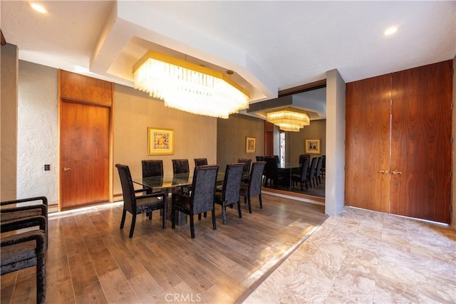 23615 Falcons View Dr, Diamond Bar, CA 91765 - dining area with a chandelier, wood finished floors, a textured wall, and recessed lighting