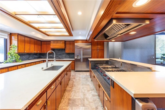 23615 Falcons View Dr, Diamond Bar, CA 91765 - kitchen with stainless steel built in refrigerator, a sink, brown cabinetry, and a spacious island