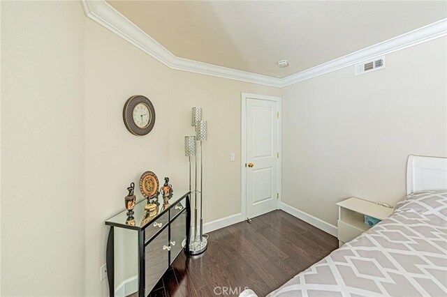 13184 Spire Cir, Chino Hills, CA 91709 - unfurnished bedroom with ornamental molding, dark wood-type flooring, and baseboards
