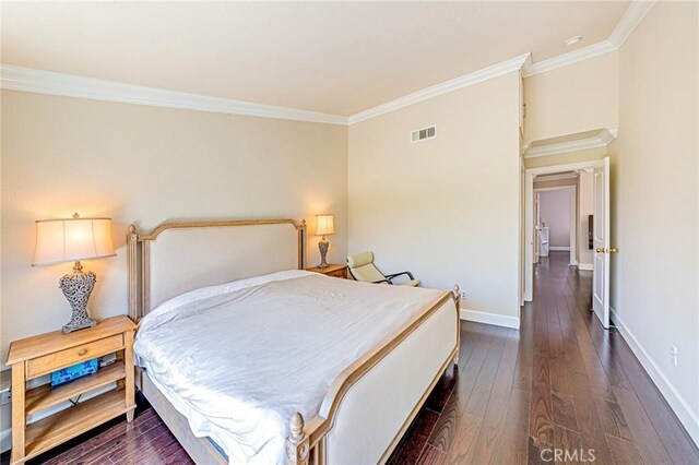 13184 Spire Cir, Chino Hills, CA 91709 - bedroom featuring crown molding, dark wood-style flooring, and baseboards