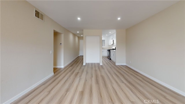 333 Burchett St Unit 203, Glendale, CA 91203 - unfurnished living room featuring recessed lighting and light wood finished floors