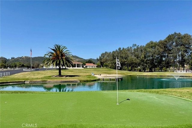 26465 Douglas Ave, Murrieta, CA 92562 - surrounding community featuring a water view, a putting area, and a lawn
