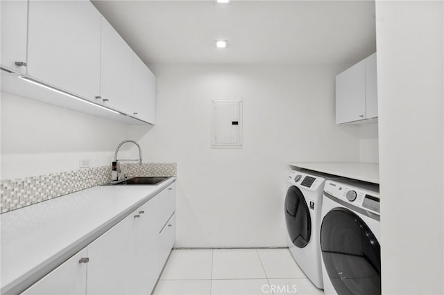 1046 N Hillcrest Rd, Beverly Hills, CA 90210 - laundry area with separate washer and dryer, electric panel, cabinet space, and light tile patterned floors