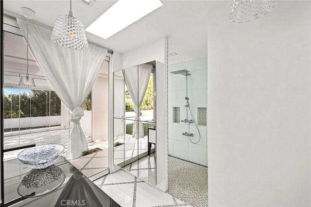1046 N Hillcrest Rd, Beverly Hills, CA 90210 - full bathroom featuring walk in shower, a chandelier, and tile patterned floors