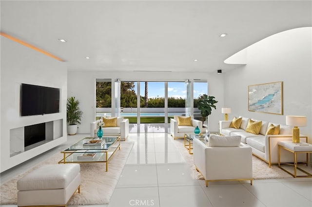 1046 N Hillcrest Rd, Beverly Hills, CA 90210 - living room featuring recessed lighting and tile patterned floors