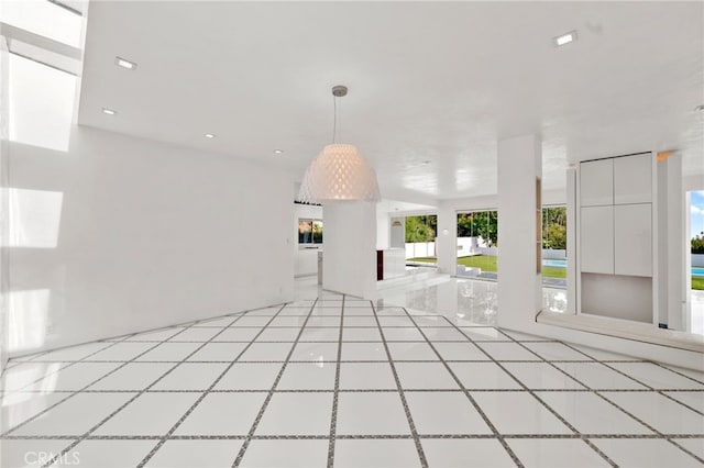 1046 N Hillcrest Rd, Beverly Hills, CA 90210 - empty room featuring light tile patterned flooring