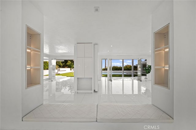 1046 N Hillcrest Rd, Beverly Hills, CA 90210 - interior space with tile patterned flooring and healthy amount of natural light