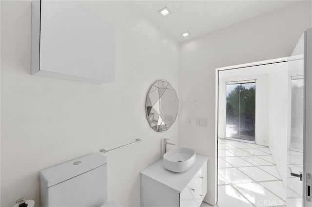 1046 N Hillcrest Rd, Beverly Hills, CA 90210 - bathroom featuring toilet and vanity