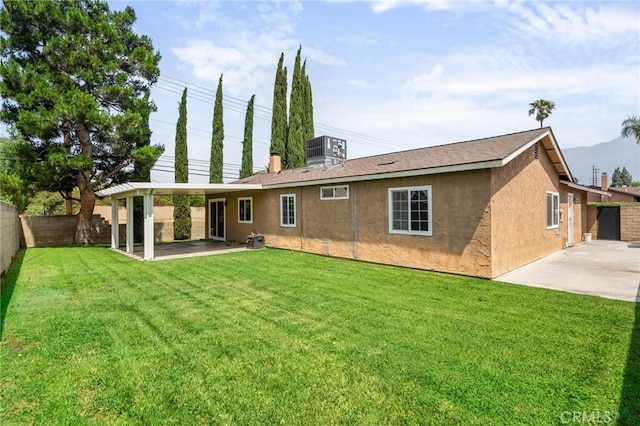 10113 Hemlock St, Rancho Cucamonga, CA 91730 - rear view of property with a patio, central AC, stucco siding, and a mountain view