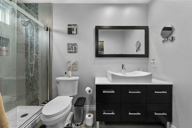 10113 Hemlock St, Rancho Cucamonga, CA 91730 - full bathroom with toilet, vanity, a stall shower, and baseboards