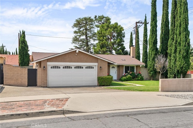 10113 Hemlock St, Rancho Cucamonga, CA 91730 - view of front of property featuring driveway, a garage, stucco siding, and a chimney