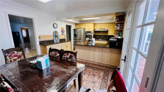 4127 W 130th St, Hawthorne, CA 90250 - kitchen featuring stainless steel appliances, under cabinet range hood, a peninsula, light tile patterned floors, and a raised ceiling