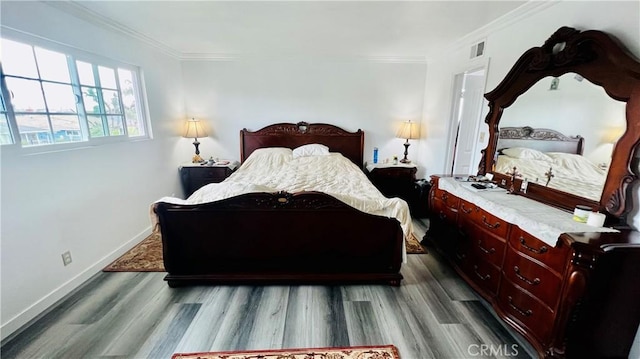 4127 W 130th St, Hawthorne, CA 90250 - bedroom with crown molding and dark wood-style floors