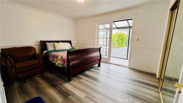 4127 W 130th St, Hawthorne, CA 90250 - bedroom featuring crown molding, access to outside, wood finished floors, and a closet